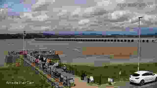 Shore near the pier in Arnside village, England, UK