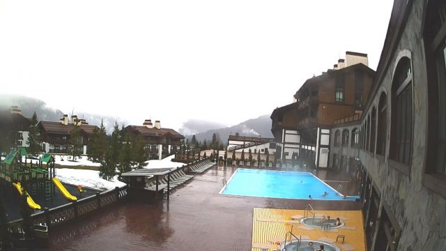 Mountain resort Gazprom. Swimming pool on the terrace of the hotel "Polyana 1389 Hotel and Spa" in the village of Estosadok, Russia