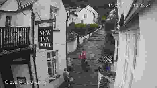 High street in Clovelly village, England, UK