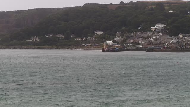 Lighthouse in the harbor of Penzance town, England, UK